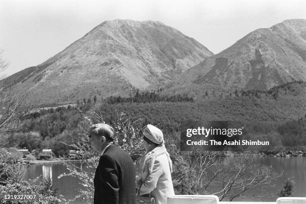 Emperor Hirohito and Empress Nagako visit Ukinunoike Pond to see Mt. Sanbe on April 18, 1971 in Oda, Shimane, Japan.