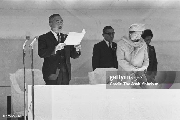 Emperor Hirohito addresses while Empress Nagako listens during the 22nd National Tree Planting Festival at Mt. Sanbe on April 18, 1971 in Oda,...