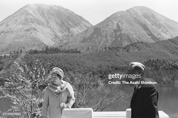 Emperor Hirohito and Empress Nagako visit Ukinunoike Pond to see Mt. Sanbe on April 18, 1971 in Oda, Shimane, Japan.