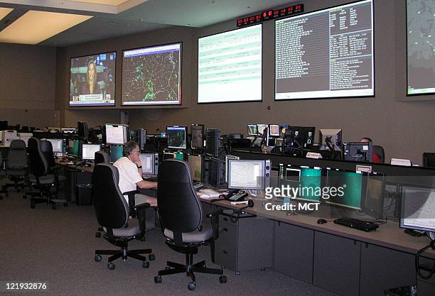 Employees monitor U.S. Airspace at the FAA's Air Traffic Control System Command Center in Warrenton, Virginia, on Wednesday, August 17, 2011.