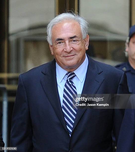 Dominique Strauss-Kahn leaves Manhattan Criminal Court after attending a status hearing on the sexual assault charges against Strauss-Kahn on August...