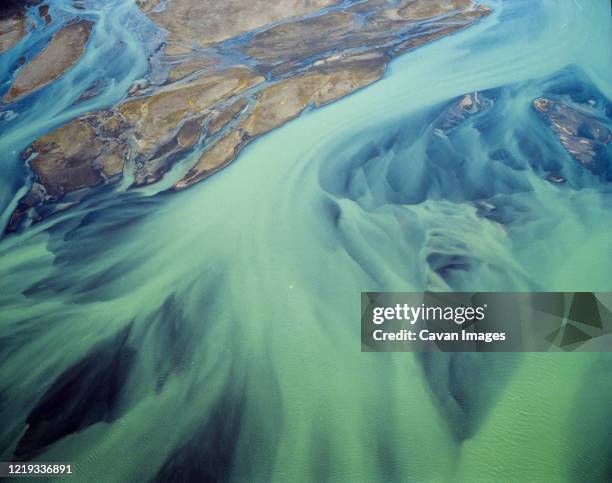 aerial view of braided rivers in southern iceland - geologie stock-fotos und bilder