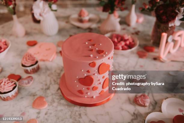 marble table with pink sweets and cake - pink wedding dress stock pictures, royalty-free photos & images