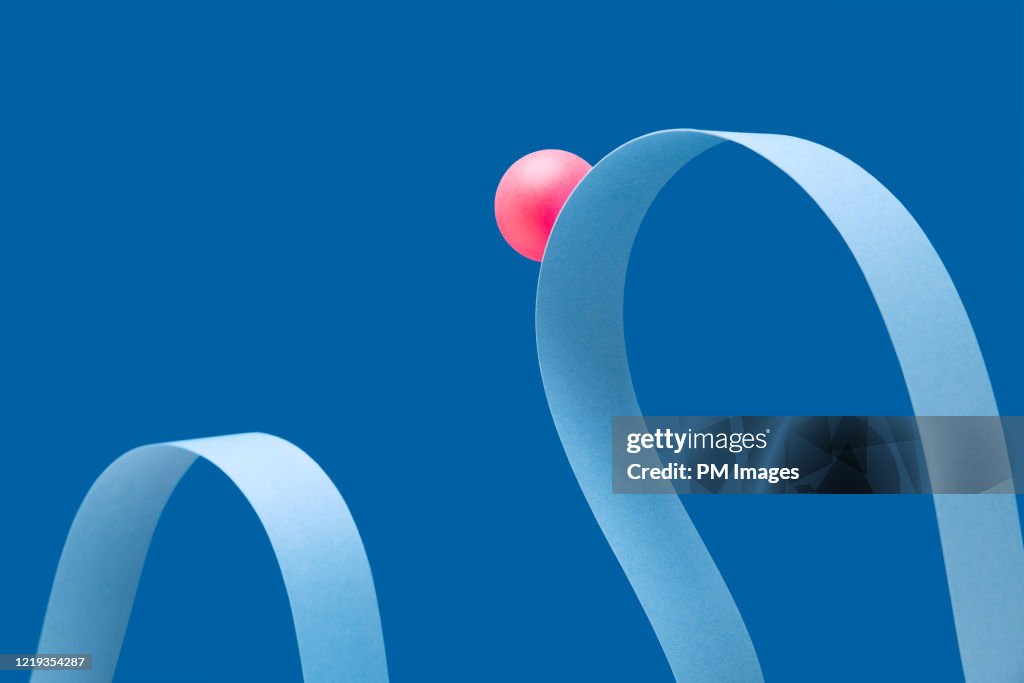 Abstract roller coaster, red ball