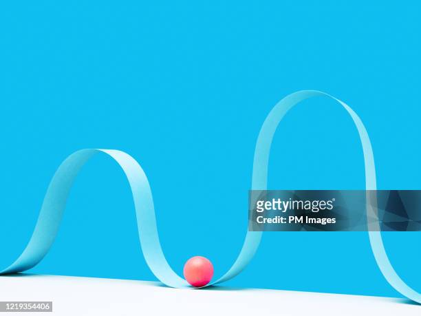 abstract roller coaster, red ball at the bottom - anticipation rollercoaster stock pictures, royalty-free photos & images