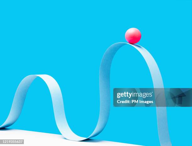 red ball on crest of the wave - behaviour change stock pictures, royalty-free photos & images