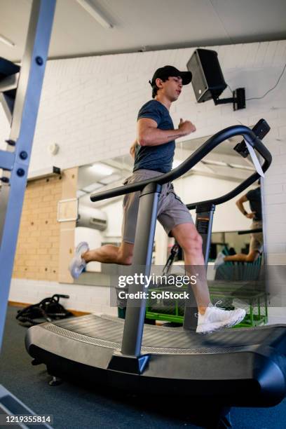 running on the treadmill - running on treadmill stock pictures, royalty-free photos & images