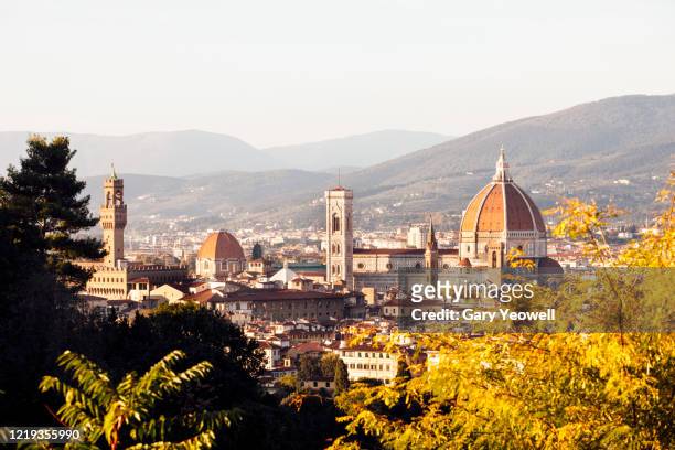 elevated view over the city of florence at sunset - florence ストックフォトと画像