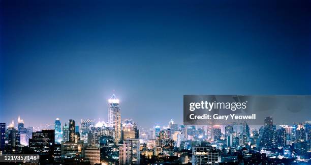 elevated view over bangkok city skyline at night - bangkok night stock pictures, royalty-free photos & images