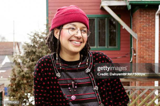 portrait of young woman outdoors, usa - nb stock pictures, royalty-free photos & images