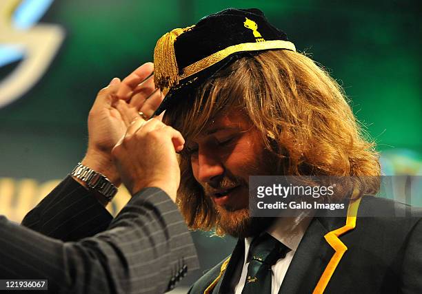Francois Steyn receives his cap during the South Africa Rugby World Cup Squad announcement and press conference at SuperSport Studios, Randburg on...