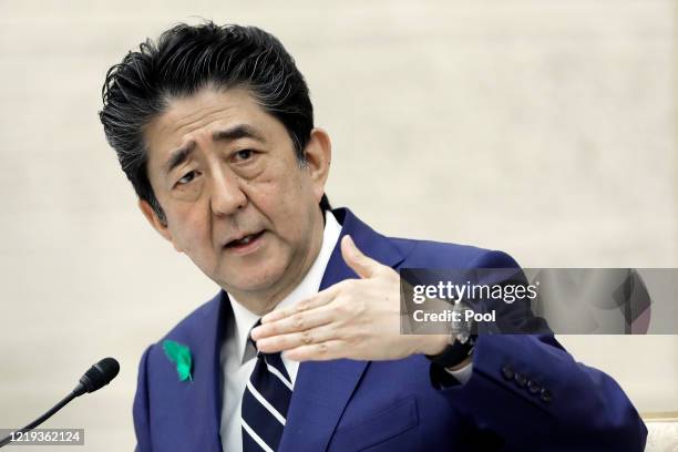 Shinzo Abe, Japan's prime minister, gestures as he speaks during a news conference at the prime minister's official residence on April 17, 2020 in...