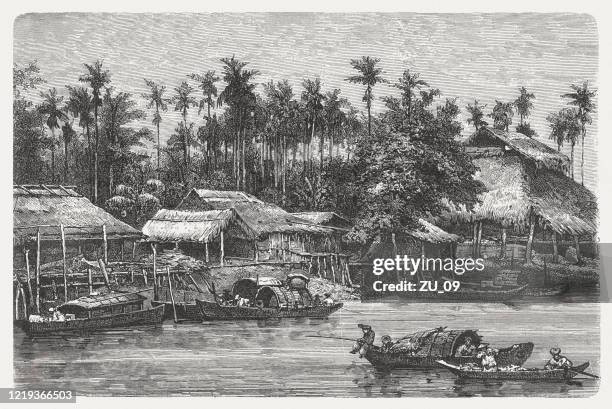 vietnamese village, wood engraving, published in 1893 - vietnam jungle stock illustrations