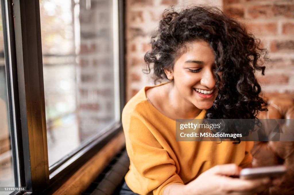 Using Mobile Stock Photo Using Mobile Phone High-Res Stock Photo - Getty Images