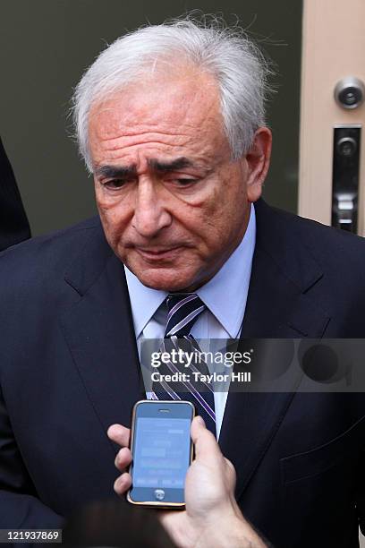 Dominique Strauss-Kahn makes a statement after his court appearance after arriving at his temporary residence in the Tribeca neighborhood of New York...