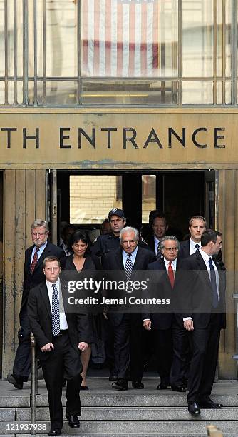 Dominique Strauss-Kahn with Anne Sinclair and lawyers William Taylor and Benjamin Brafman depart Manhattan Criminal Court after charges of sexual...