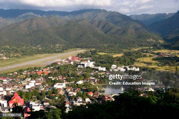 View of Mae Hong Son town with single runway airport and Jong Kham Lake north Thailand.