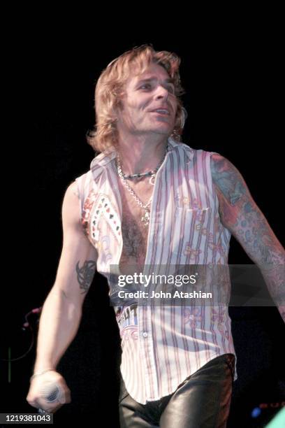 Singer and songwriter Mike Tramp is shown performing on stage during a "live" concert appearance with White Lion on March 13, 2005.