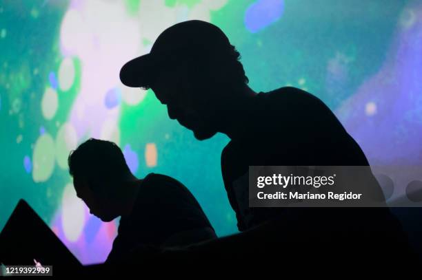 British electronic musician Matt Cutler, aka Lone, and Scottish electronic musician Tom Scholefield, aka Konx-Om-Pax, performs in concert during...