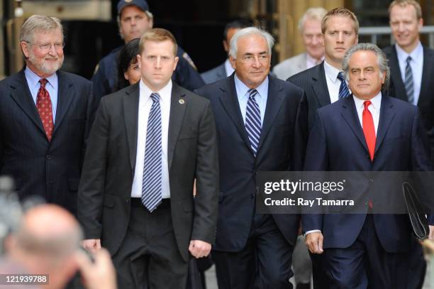 Dominique Strauss-Kahn and attorney Benjamin Brafman leave Manhattan Criminal Court after attending a status hearing on the sexual assault charges...