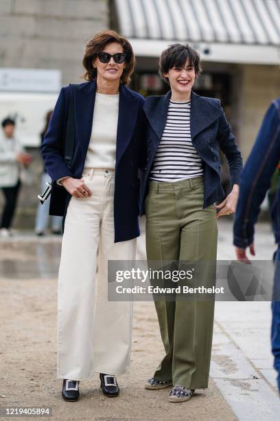 Ines de la Fressange and Nine D'Urso are seen, outside Dior, during Paris Fashion Week - Womenswear Fall/Winter 2020/2021, on February 25, 2020 in...