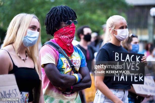 Protesters gather outside the Hennepin county Government Center during a Justice for George Floyd demonstration on June 11, 2020 in Minneapolis,...