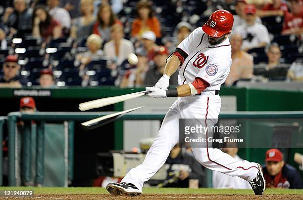 Danny Espinosa of the Washington Nationals breaks his bat in the ninth inning against the Arizona Diamondbacks at Nationals Park on August 23, 2011...