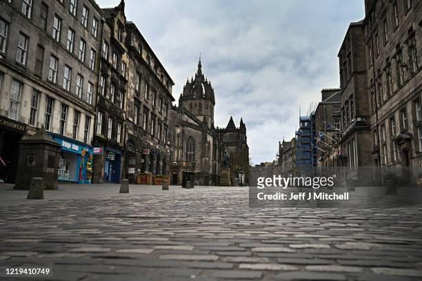 Members of the public are seen out on the Royal Mile during the coronavirus pandemic on April 17, 2020 in Edinburgh, Scotland. The Coronavirus...
