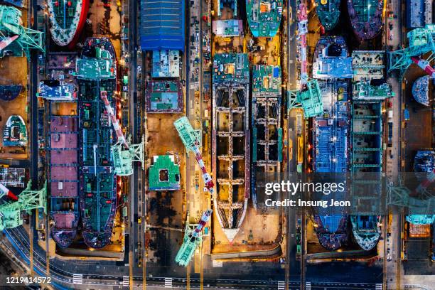 aerial view of the shipyards and docks - shipyard aerial stock pictures, royalty-free photos & images