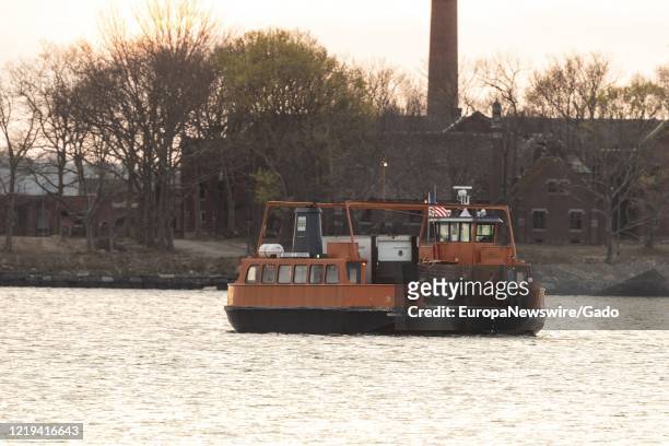 Ferry carrying Special Operation Medical Examiner refrigerated truck with bodies of COVID-19 coronavirus dead, known colloquially as Barge of the...