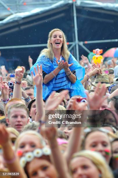 Crowd scene at the 4 Music Stage during the 1st day of the V Festival in Hylands Park on August 20, 2011 in Chelmsford, United Kingdom.