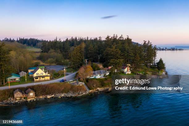 aerial view of the west side of lummi island during a beautiful sunrise. - contea di whatcom foto e immagini stock