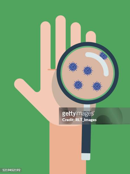 abbildung der lupe, die virus auf menschliche hand enthüllt - kontaminierung stock-grafiken, -clipart, -cartoons und -symbole