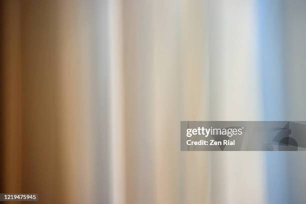 backlit curtain creating linear patterns - tissu transparent photos et images de collection