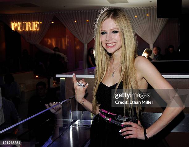 Recording artist Avril Lavigne appears at a MAGIC clothing convention after party for her Abbey Dawn clothing line at the Pure Nightclub at Caesars...