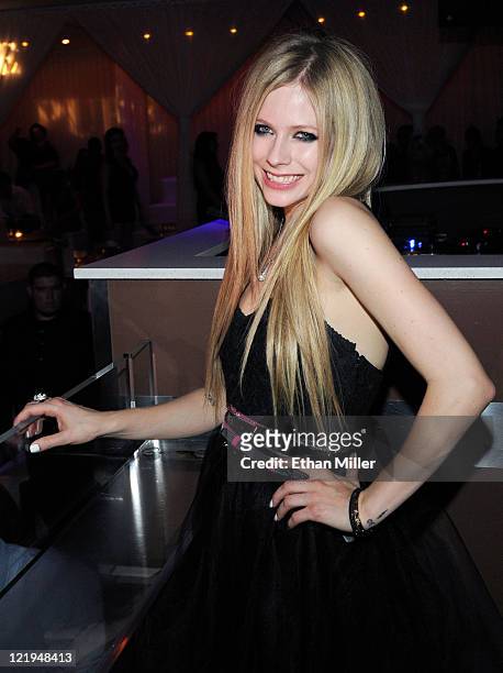 Recording artist Avril Lavigne appears at a MAGIC clothing convention after party for her Abbey Dawn clothing line at the Pure Nightclub at Caesars...