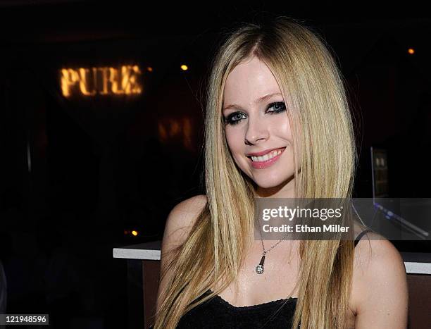 Recording artist Avril Lavigne appears at a MAGIC clothing convention after party for her Abbey Dawn clothing line at the Pure Nightclub at Caesars...