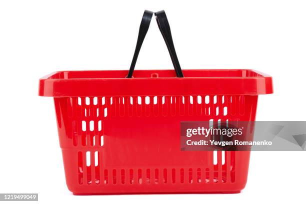 side view of red plastic shopping basket isolated on white background - shopping basket icon stock pictures, royalty-free photos & images