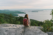 Scenic  view of woman looking at  lake in Finland