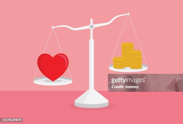 heart and money on a weight scale - cartoon money stock illustrations