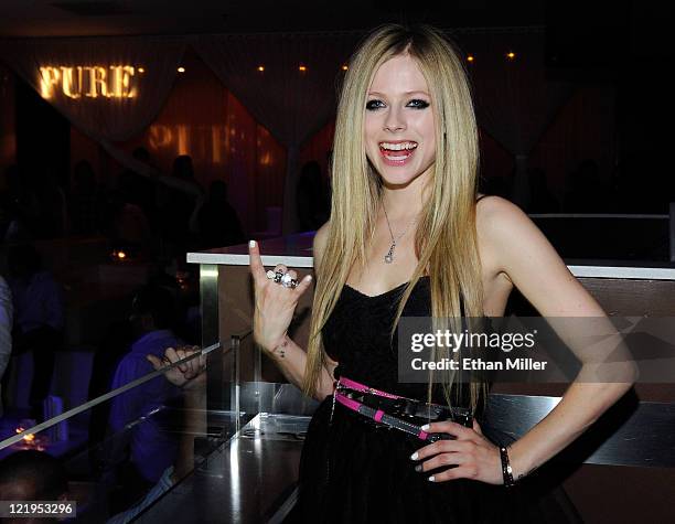 Recording artist Avril Lavigne appears at a MAGIC clothing convention after party for her Abbey Dawn clothing line at the Pure Nightclub at Caesars...