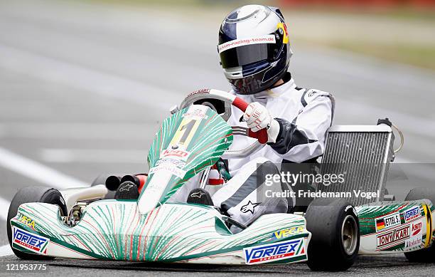 Sebastian Vettel drives Kart during the 50th birthday of the Kart Club Kerpen on August 24, 2011 in Kerpen, Germany.