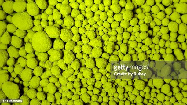 abstract view of  green japanese matcha tea powder balls - organic compound stock pictures, royalty-free photos & images