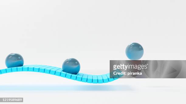 balls on a rubber track - color surge vibrant color hd stock pictures, royalty-free photos & images