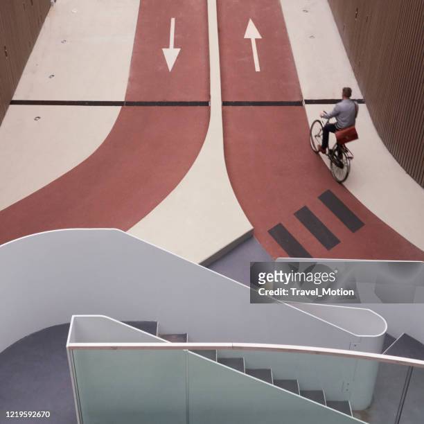 station parking facilty cycleways in utrecht, the netherlands - utrecht stock pictures, royalty-free photos & images
