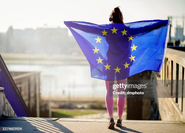 fitness woman with eu flag - serbia eu stock pictures, royalty-free photos & images