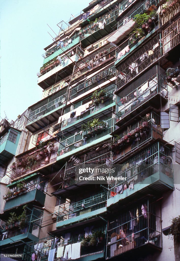 Balconies of Crowded High Rise in Kowloon Walled City in 1980s