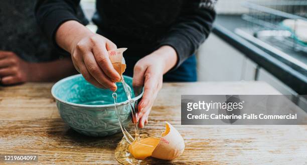 broken egg - clumsy stock pictures, royalty-free photos & images