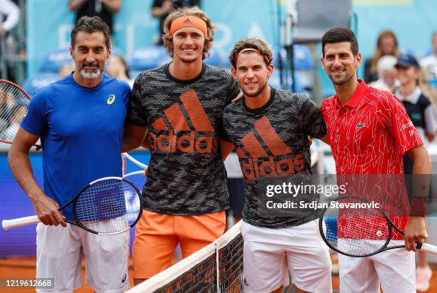 Nenad Zimonjic of Serbia, Alexander Zverev of Germany, Dominic Thiem of Austria and Novak Djokovic pose for a photo prior to the exhibition double...