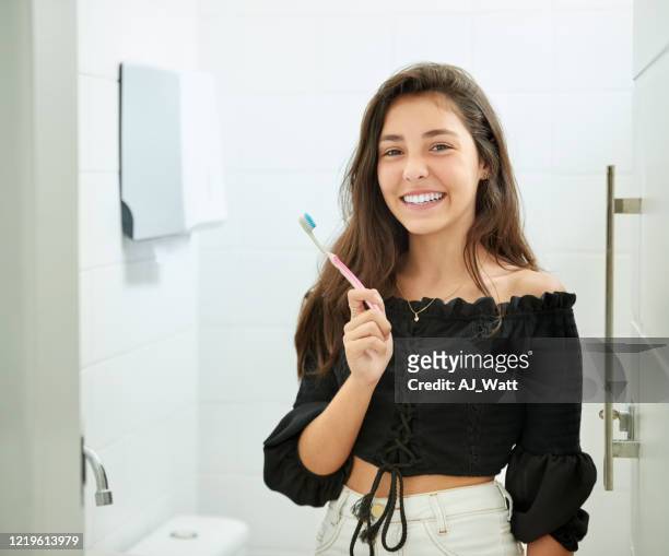 brush three times a day for a picture perfect smile - human teeth stock pictures, royalty-free photos & images